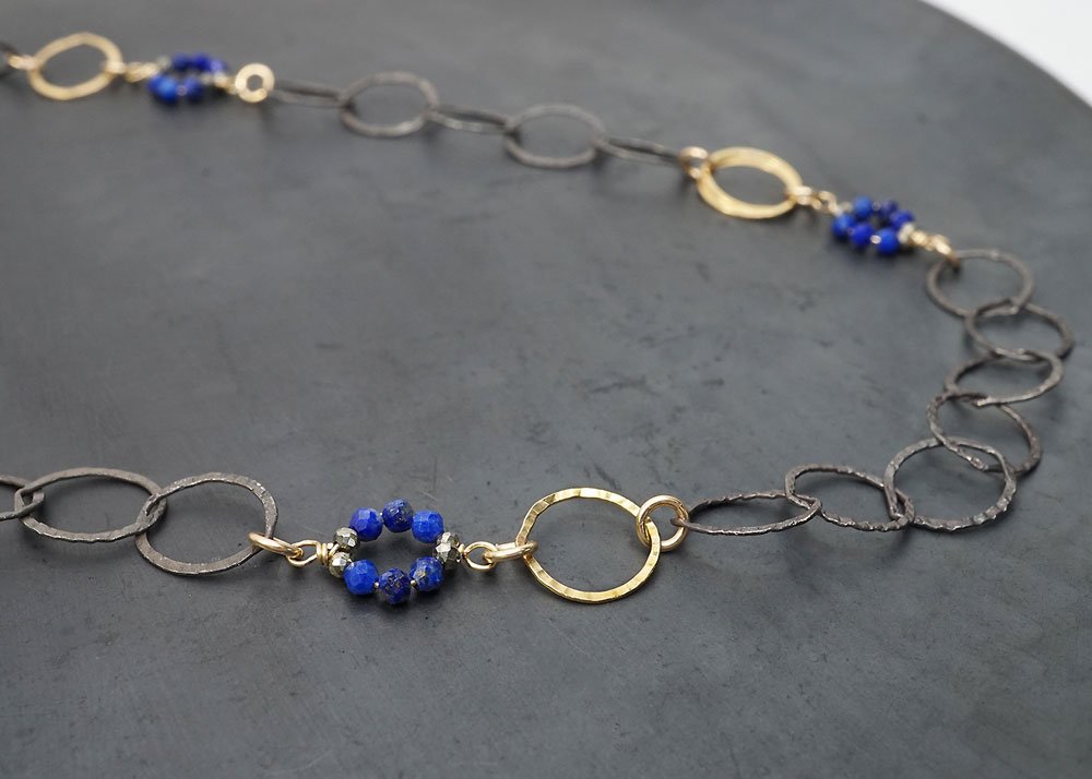 Oxidized sterling silver and 14k gold-filled chain with wrapped lapis and pyrite circles